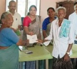 MLA Seethakka parents gets Podu lands pass book