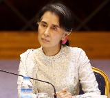 Aung San Suu Kyi jail term reduced after some pardons