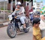 Asaduddin Owaisi vrooms on bike in Hyderabad