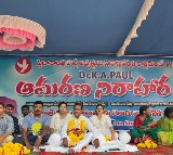 KA Paul touches CM collar in Visakhapatnam