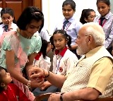 PM celebrates Raksha Bandhan with school girls