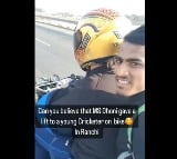 Dhoni offers lift to a young cricketer on his sports bike