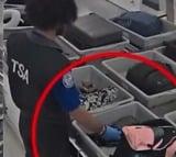 US Airport Officers Caught On Camera Stealing Money From Passengers Bags