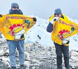 Telugudesam party flag hoisted at Everest base camp