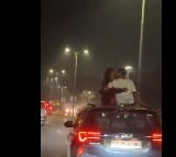 Couple Openly Kisses From Moving Car Roof During Night Drive in Hyderabad