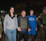 Two American hostages released by Hamas return to Israel