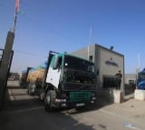 Rafah border crossing opens, first aid trucks enter Gaza