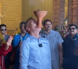 US Ambassador Eric Garcetti performs Dunuch Nach at Durga pandal in Delhi
