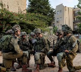 Palestinian gunmen clash with Israeli troops in Gaza