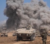 Israeli forces surround Gaza city