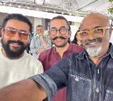 Aamir Khan poses with OG 'Ghajini' star Suriya as they attend Kamal Haasan's b'day party