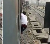 Mobile Thief Dangles Outside Train Window in Bihar