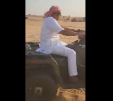Malla Reddy riding in desert bike in Dubai sands