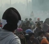 Haryana Police use tear gas to disperse protesting farmers at
 inter-state border