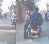 Hyderabad Rapido rider seen pushing scooter with passenger onboard Here is viral video