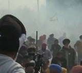 Tear gas fired to stop farmers march to Delhi tensions at Haryana Punab Border