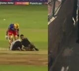 Security Officials Beat Up Fan Who Invaded Pitch To Touch Virat Kohli Feet During RCB vs PBKS IPL 2024 Match