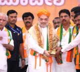 K'taka CM saving his chair which Dy CM is trying to snatch: Amit Shah