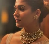 Nayanthara wows fans with her picture in striped saree, choker necklace