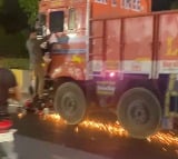 lorry driver hits a bike and drags it underneath for 2 kms