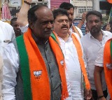 BJP Leader Laxman Criticizes KCR Bus Yatra 