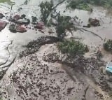 Flash floods and cold lava flow hit Indonesias Sumatra island 37 dead