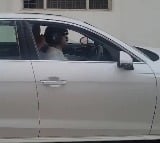 Fined 1000 UP Man Now Drives His Audi With A Helmet On