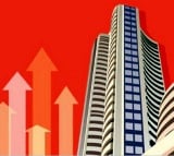 Sensex jumps 212 points on positive global cues