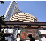 Sensex trades flat amid selling in midcap stocks