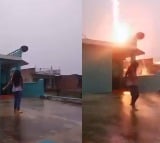 Girl narrowly escapes lightning strike while making reel in Sitamarhi Video goes Viral