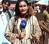 Bull interrupts live TV coverage hits Pakistani female journalist