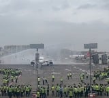 Team accorded 'water salute' after plane lands, Mumbai buzzing with chants of ‘India ka Raja Rohit Sharma’ as champions return