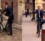 Ex Netherlands PM Mark Rutte leaves office on bicycle after handing over power to successor Dick Schoof