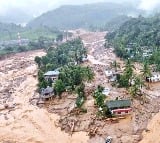 Wayanad Landslide Heart wrenching video of man clinging to boulder to survive emerges