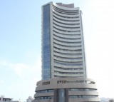 Sensex, Nifty end flat, IT and PSU bank shares shine