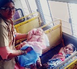 TGSRTC condoctor helps woman in bus