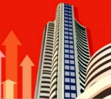 Sensex closes up 378 points, bank shares lead the rally