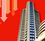 Sensex trades lower on mixed global cues