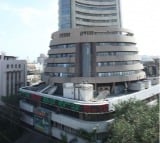 Sensex ends flat, Nifty at 25,052 after hitting fresh all-time high