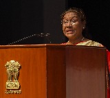 President Murmu unveils new flag & insignia of the Supreme Court