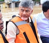 Chandrababu Naidu visits flood-affected Vijayawada in a boat