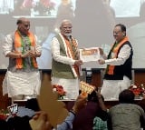 PM Modi launches BJP's membership campaign, becomes first member