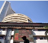 Sensex trades flat, FMCG stocks gain