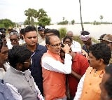 Shivraj Singh Chouhan visits flood hit areas in AP