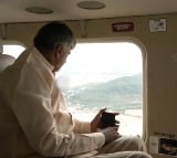 CM Chandrababu takes aerial survey on flood hit areas