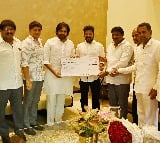 Pawan Kalyan meets Revanth Reddy, hands over Rs 1 crore cheque for CM's relief fund