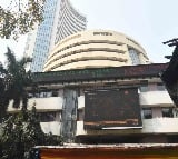 Sensex closes above 83000