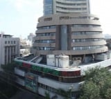 Markets shed gains after record high, Sensex closes at 84,914