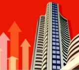 Sensex closes flat, IT and auto stocks gain