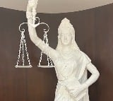 Lady Justice in SC library now holds a Constitution with open eyes